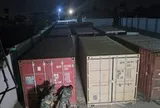 Phát hiện 12 container dài 6m chở số lượng lớn tiền mặt và vàng thỏi được ngụy trang tinh vi trong 1 nhà kho bí mật