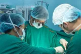 Dị vật kẹt 6 tháng trong cổ bé trai 6 tuổi, chèn ép khí quản