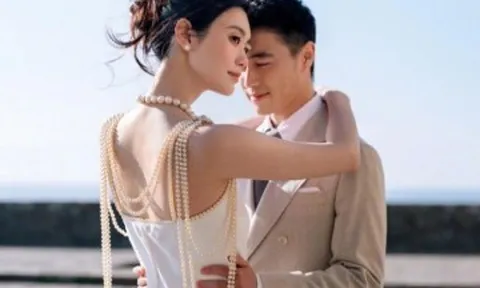 Hề Mộng Dao đeo vòng cổ của mẹ chồng trong tiệc cưới