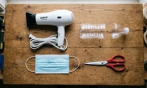 Mẹo hút bụi bằng máy sấy tóc